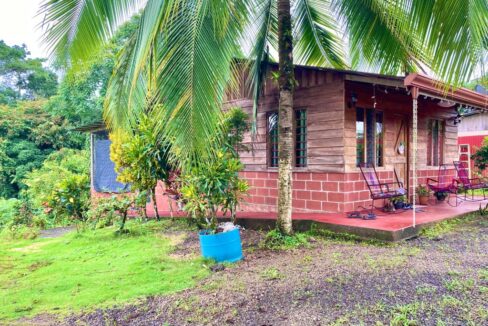Rustic wood house with front garden in La Fortuna Costa Rica real estate
