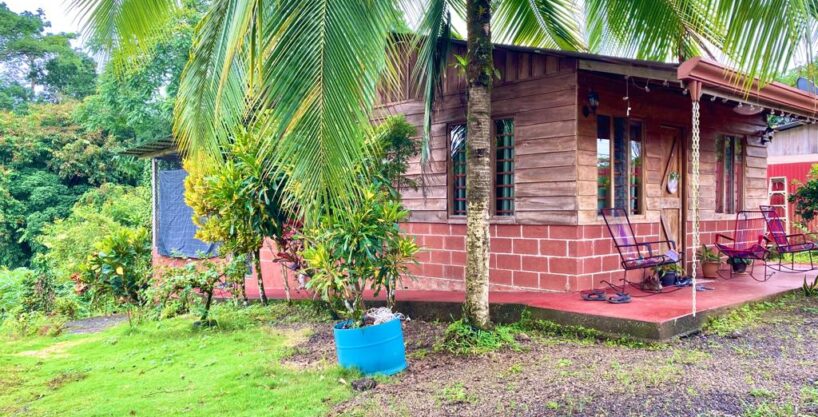 Rustic wood house with front garden in La Fortuna Costa Rica real estate