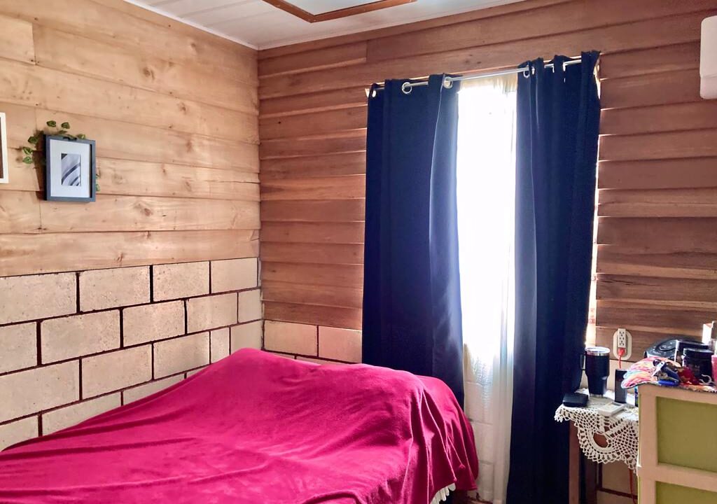 Furnished private bedroom in volcano view home for sale – Tropical Glow