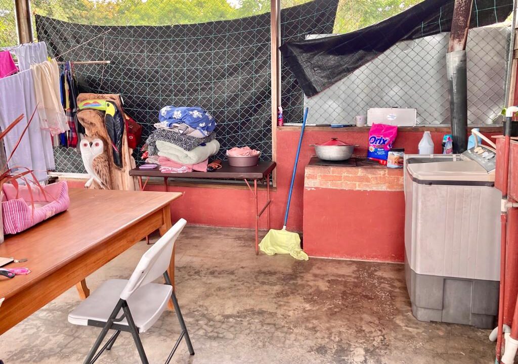 Outdoor utility space in home for sale near hot springs – Tropical Glow