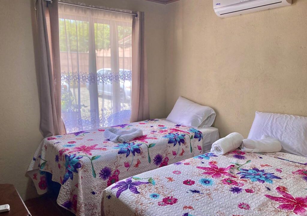 Tropical Glow bedroom in furnished rental home near Arenal Volcano in La Fortuna Costa Rica