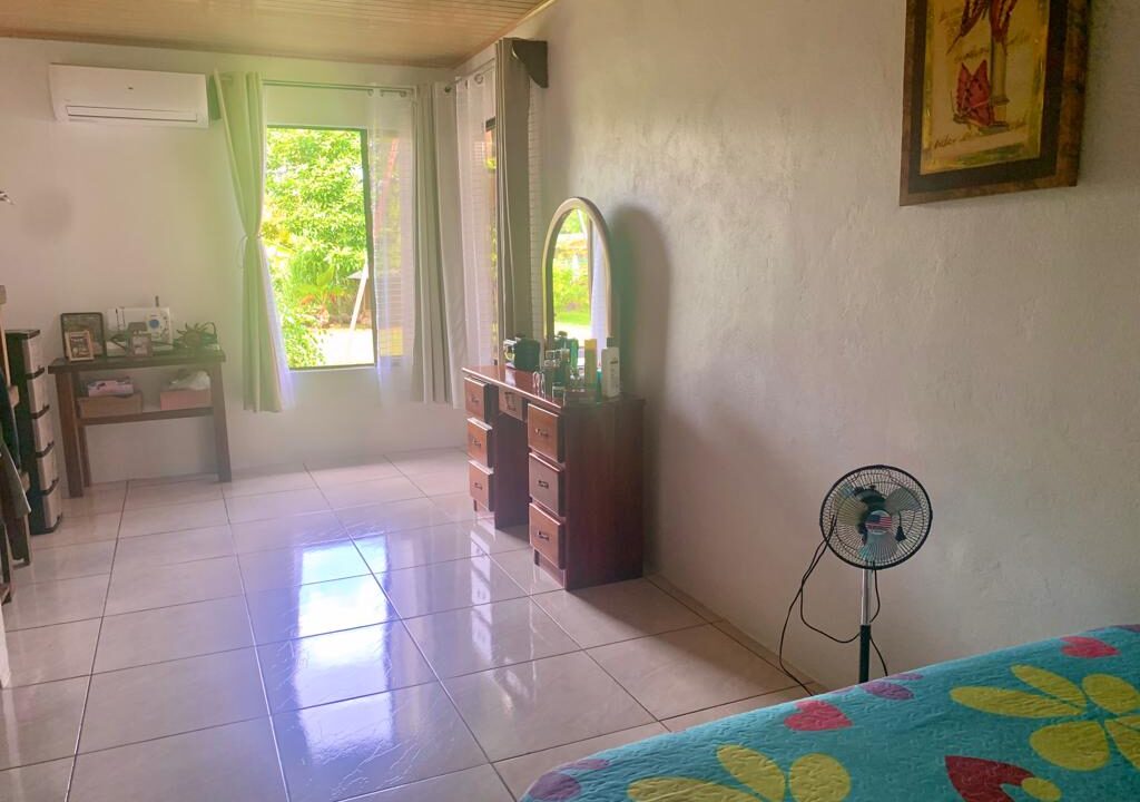 Large bedroom with natural light near Arenal Volcano in La Fortuna real estate