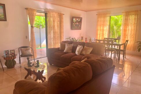 Open-plan living and dining area in La Fortuna Costa Rica Airbnb home