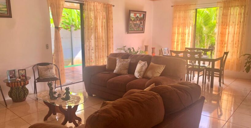 Open-plan living and dining area in La Fortuna Costa Rica Airbnb home