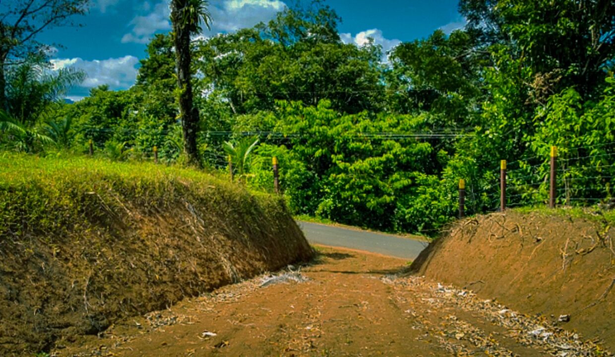 Private gated entrance leading to jungle lot in La Fortuna Costa Rica with easy road access