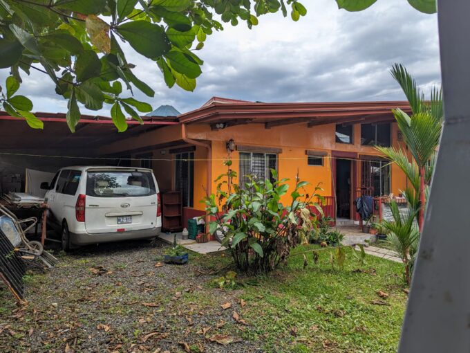 Exterior of La Fortuna duplex for sale – 6-bedroom Airbnb-ready property with volcano views. La Fortuna real estate income property arenal volcano