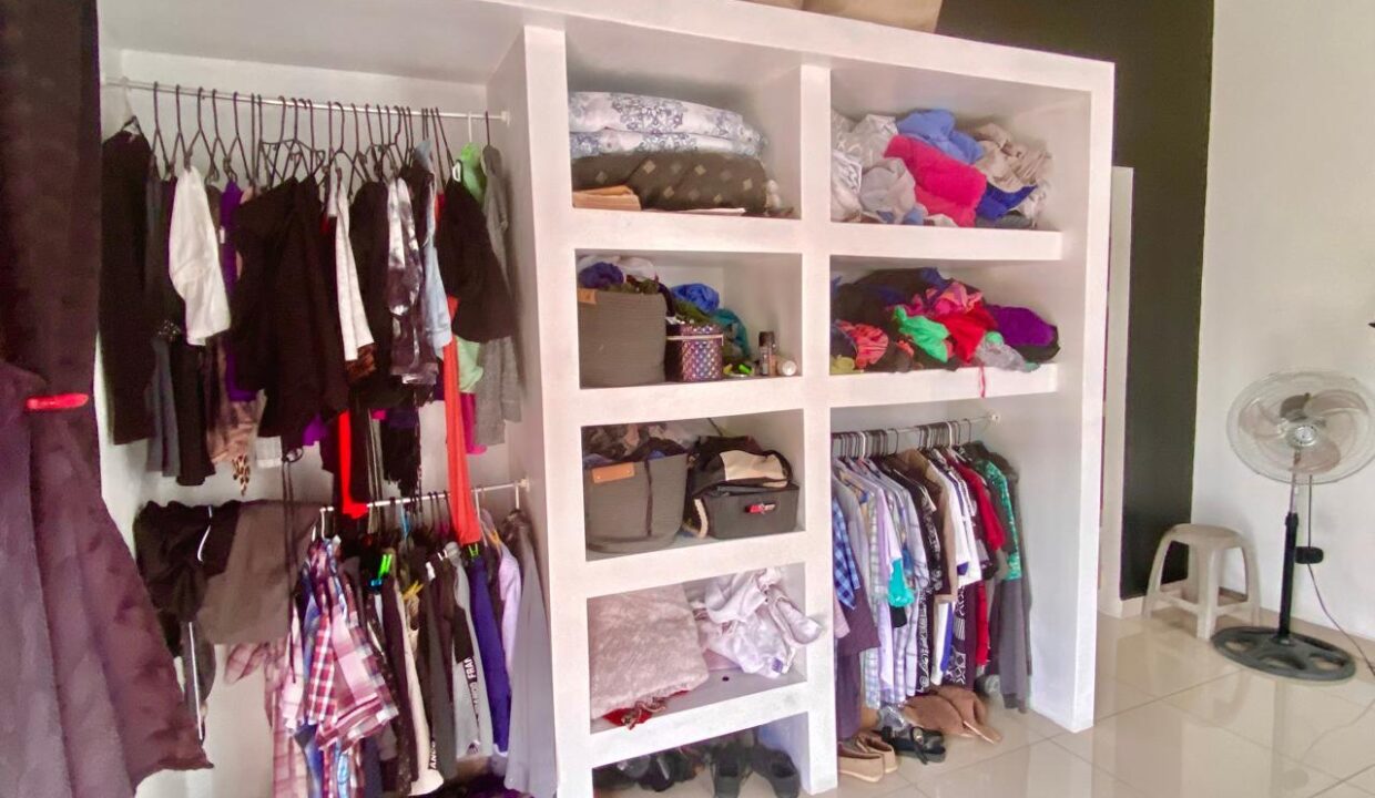 Spacious penthouse master suite with full closet and volcano-view balcony in La Fortuna