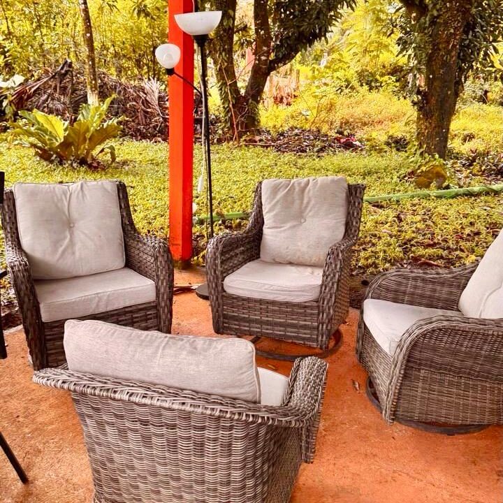 Peaceful covered patio with garden views and elegant furnishings near Arenal Volcano and hot spring destinations