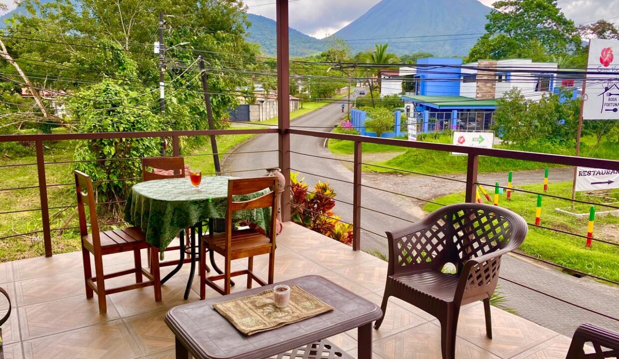 Upper terrace with stunning Arenal Volcano view and outdoor seating