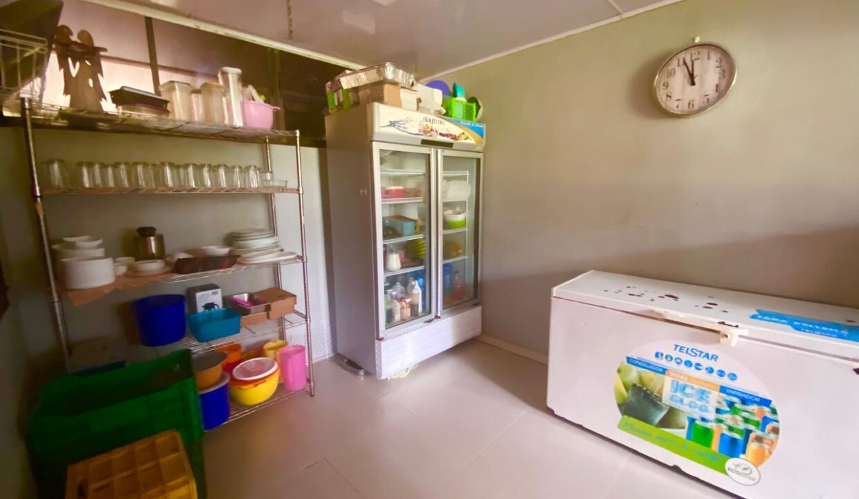 Tropical Glow - Commercial kitchen storage area at La Fortuna Costa Rica hotel near Arenal Volcano