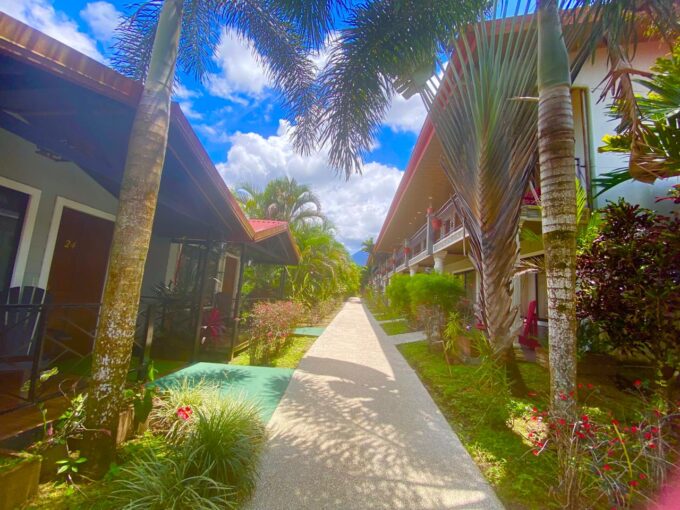 La Fortuna hotel for sale, hotel with ensuite rooms Costa Rica, two-story hotel La Fortuna, Arenal Volcano hotel property, Costa Rica hospitality investment, hotel near hot springs La Fortuna, Tropical Glow hotel listing