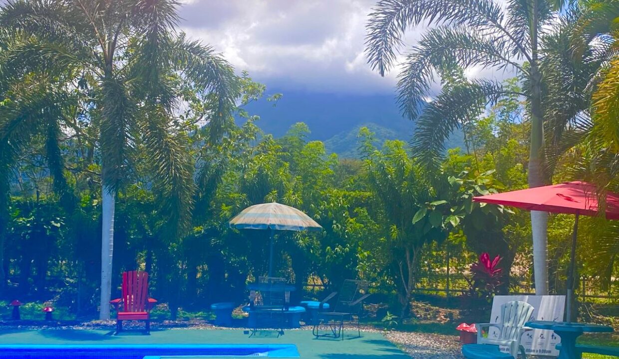 Swimming pool with direct view of Arenal Volcano at hotel in La Fortuna Costa Rica