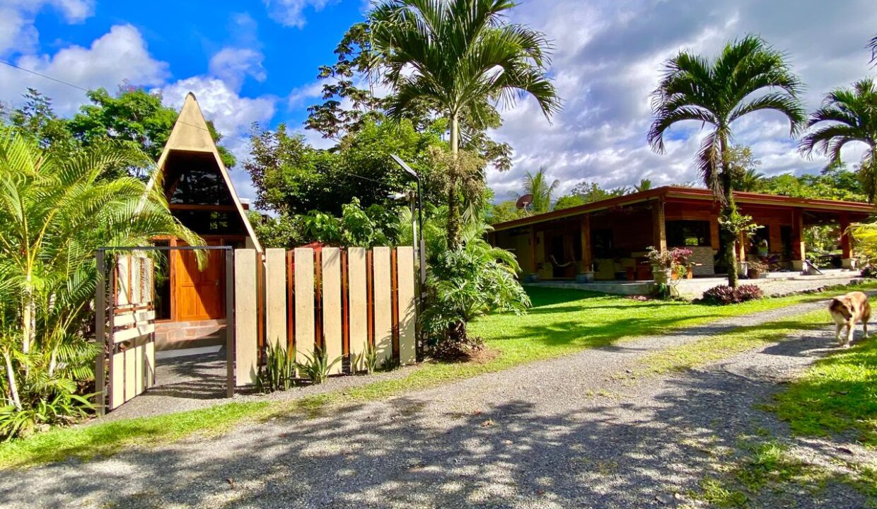 Tropical Glow gated property entrance with A-frame design near Arenal Volcano
