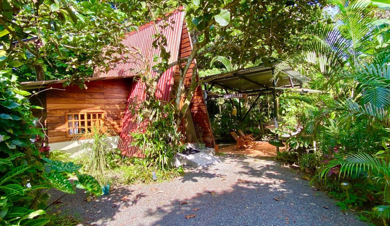 Tropical garden setting with covered patio and hammock near Arenal Volcano