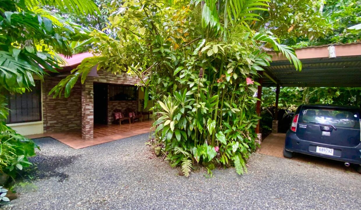 Charming income property with outdoor living space and covered parking near Arenal Volcano and hot springs.