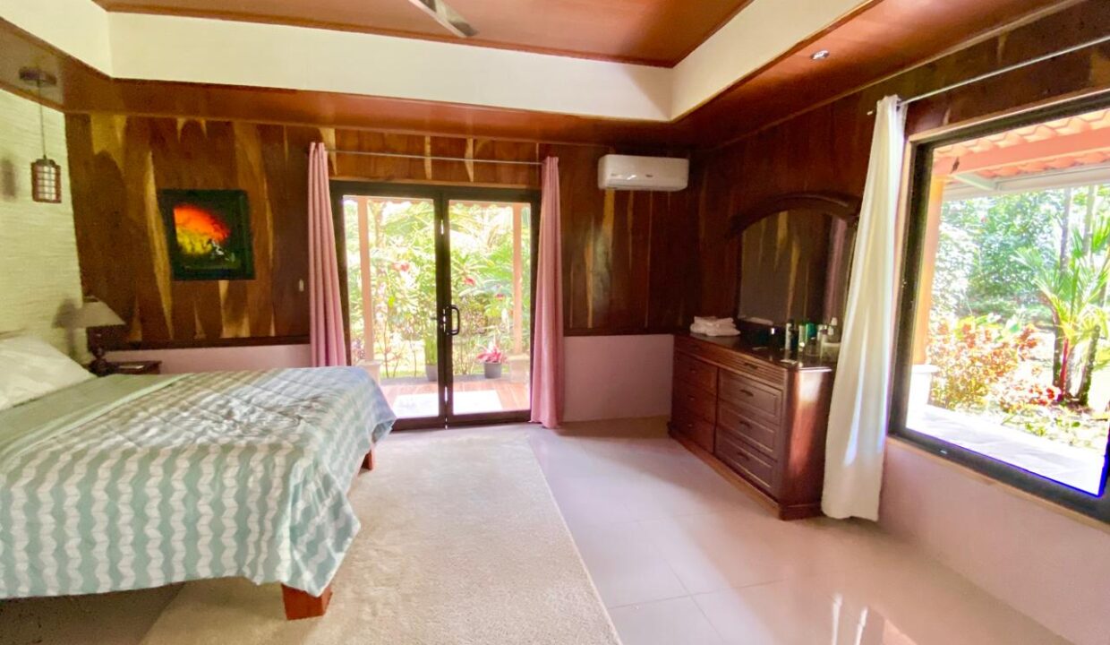 Elegant primary suite with tropical garden views in La Fortuna Costa Rica