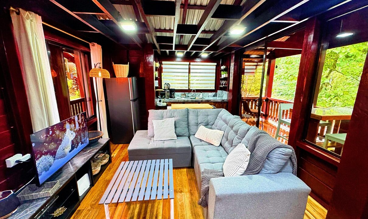 La Fortuna Costa Rica real estate near Arenal Volcano with beautiful interior and high quality wood. Great rental or family home investment.