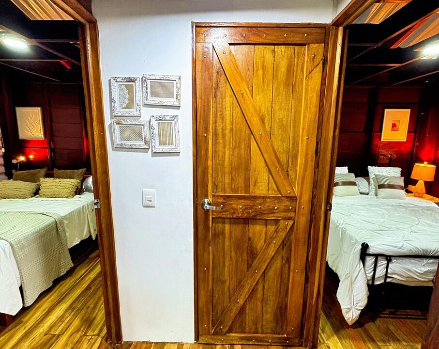 La Fortuna Costa Rica real estate with spacious bedrooms and quality wood design. Ideal vacation rental or private home near Arenal Volcano.